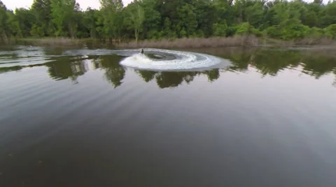 Doing a donut on a glassy lake Stock-Footage 50446971