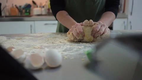 Doing egg pasta at home while lockdown in quarantine Stock Footage 131157104
