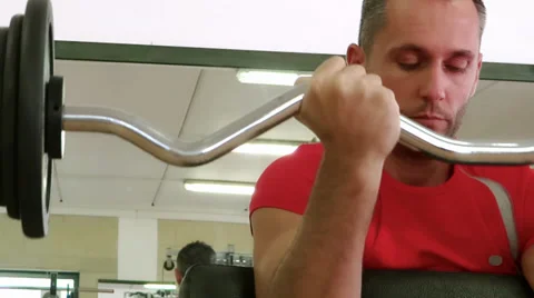 Doing exercise with barbell Video stock 30464420