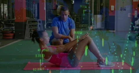Doing female trainee doing crunches on pink mat, wearing pink tank and pants 스톡 사진