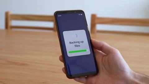 Doing files back up with cloud service on your smartphone. Stock Footage 321357921