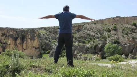 Doing gymnastics man in nature Stock Footage 65305074