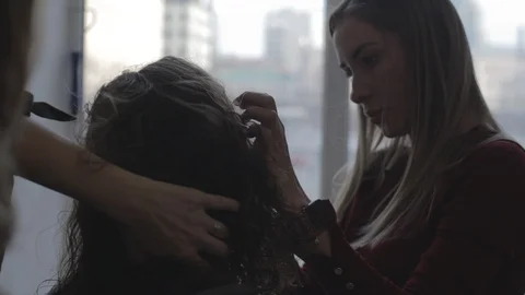 Doing hair Video stock 126479013