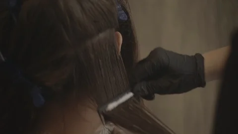 Doing hair Video stock 126480014