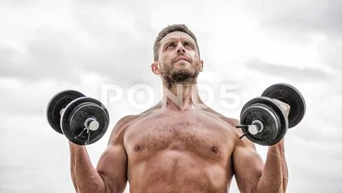 Doing his best. man sportsman with strong ab torso. steroids. fitness and sport Stock Photos