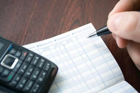 Doing home finances Stock Photos