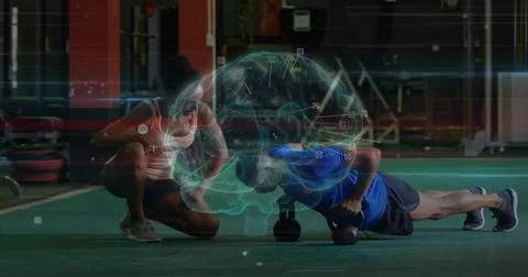 Doing kettlebell pushups, man in blue shirt on turf with coach in white tank, 3D Stock Photos
