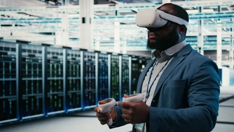 Doing machines maintenance, VR glasses equipment and employee in server hub Stock Footage 330088782