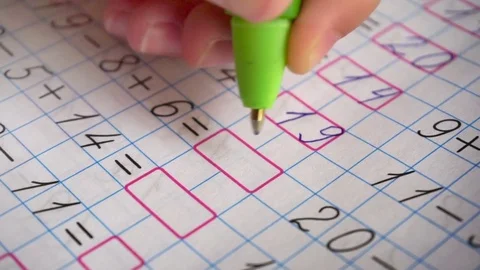 Doing math homework. Solves simple examples Video stock 75408666