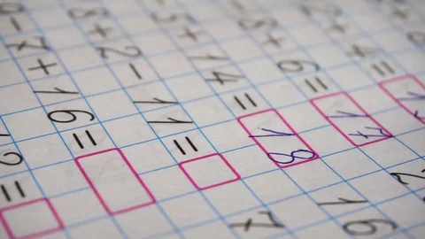 Doing math homework. Solves simple examples Video stock 75436397