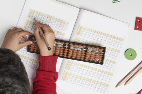 Doing mental math or mental arifmethic Stock Photos