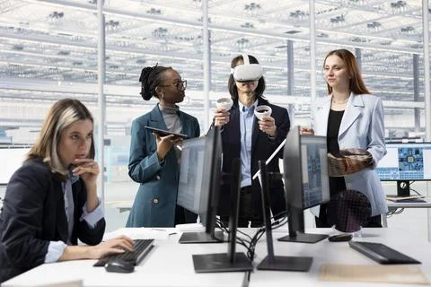 Doing microchip yield enhancement, VR headset and multiracial technicians Stock Photos
