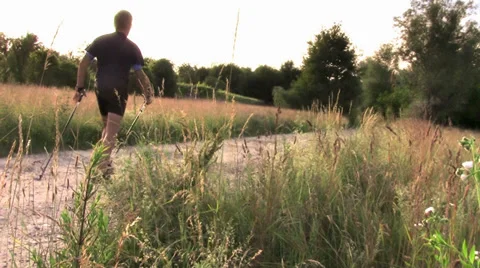 Doing nordic walking Stockbeeldmateriaal 34828105