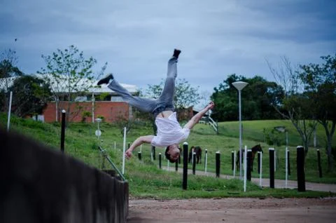 Doing parkour (side flip) Stock Photos