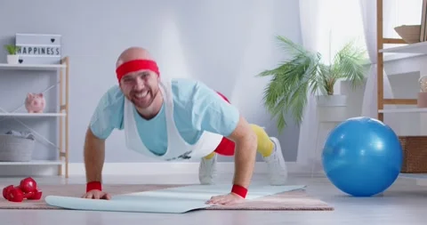 Doing push ups, funny sportsman workout motivation exercise for strong muscle Stock Footage 282904376