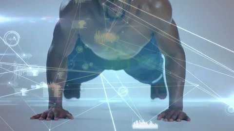 Doing push-ups, man with animation of digital data and network connections 動画素材 305121244