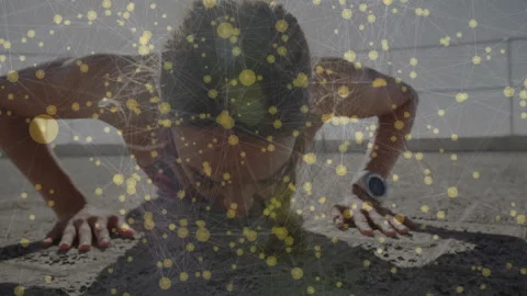 Doing push-ups, person with animation of network connections and data points 動画素材 305121359