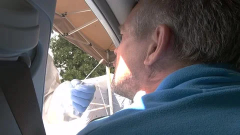 Doing the real COVID-19 tampon Stock Footage 130701468