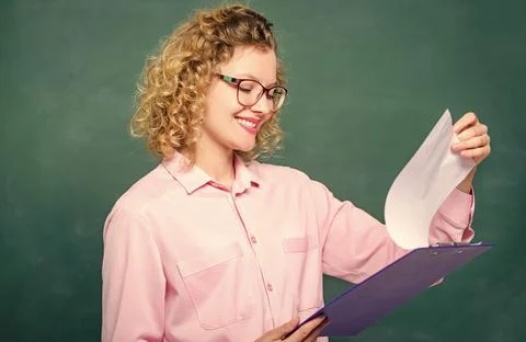 Doing research. teacher with document folder. happy student in glasses at Stock Photos