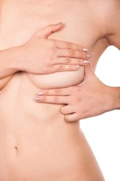 Doing a self-breast exam Stock Photos