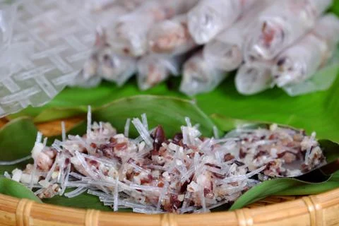 Doing spring rolls Stock Photos
