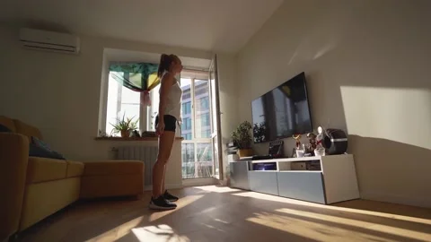 Doing Squats at Home Stock Footage 132300341