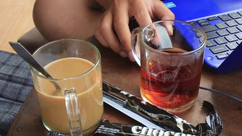 Doing tasks in front of the laptop Video stock 276138626