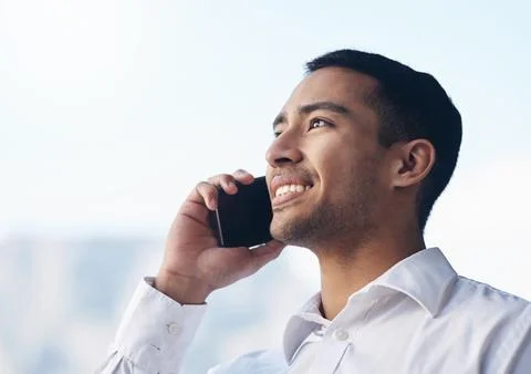Doing the work for the vision. a handsome young businessman standing alone on Stock Photos