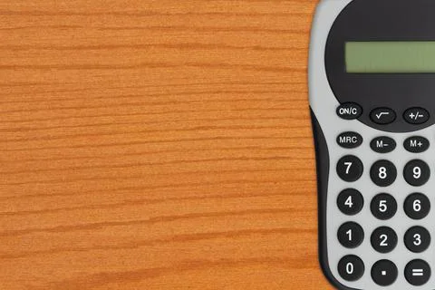 Doing your finances with a calculator Foto stock