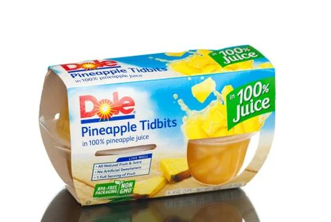 Dole Pineapple Tidbits in 100% Pineapple Juice, 4 oz, 4 count. Stock Photos