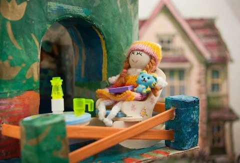Doll on the balcony Stock-Fotos
