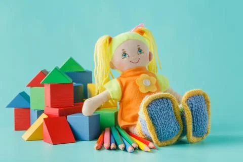 Doll with colored pencils Stock-Fotos