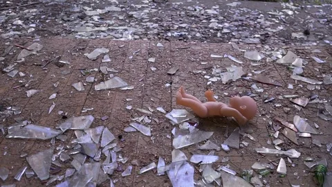 The doll falls to the floor Stock Footage 78254995