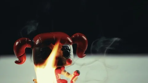 Doll fire flame studio hd footage Stock Footage 99991627