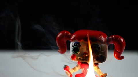 Doll fire flame studio hd footage Stock Footage 99991691