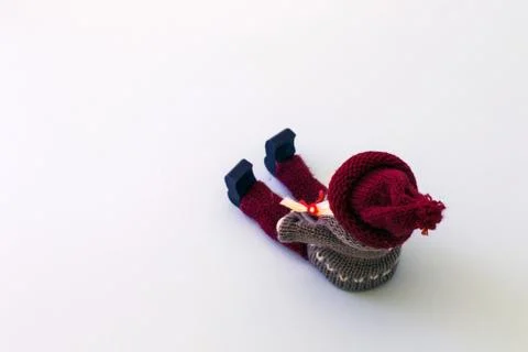 Doll girl with sitting on light background Stock Photos