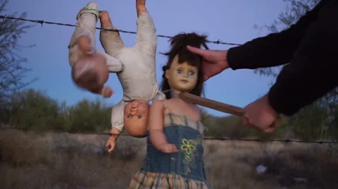 Doll Horror Beating With Stick Stock Footage 58400750