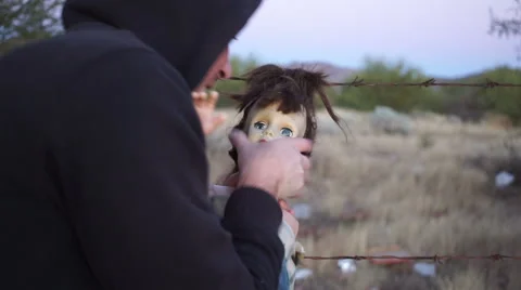 Doll Horror Lunatic Man Biting Stock Footage 58414040
