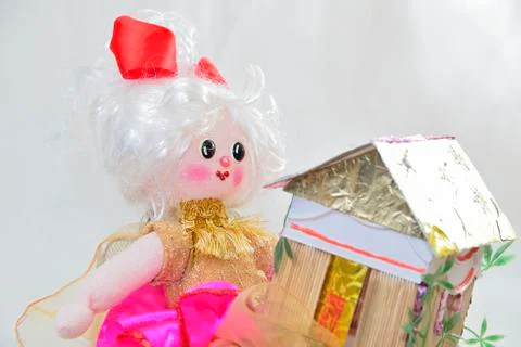Doll with house Foto stock