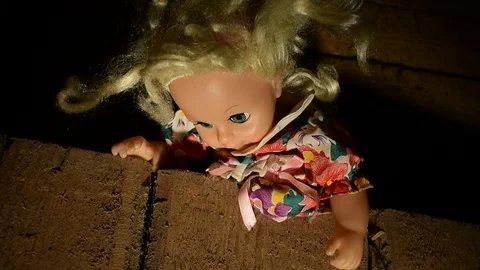 Doll looks down Stock Footage 120246382