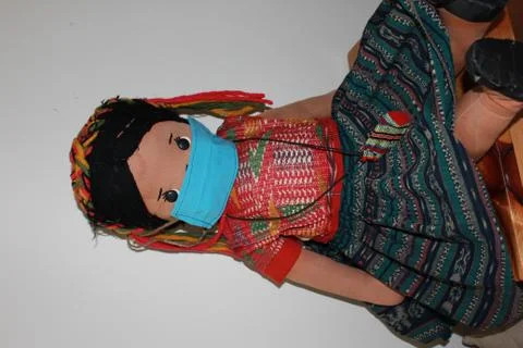 Doll with mask Stock Photos
