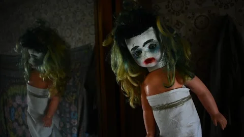 Doll by the mirror in the old house Stock Footage 135386821