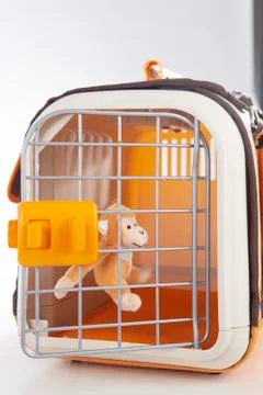 Doll monkey in the cage Stock Photos