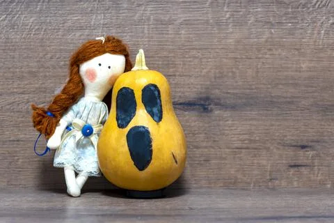 Doll, pumpkin, background Stock Photos