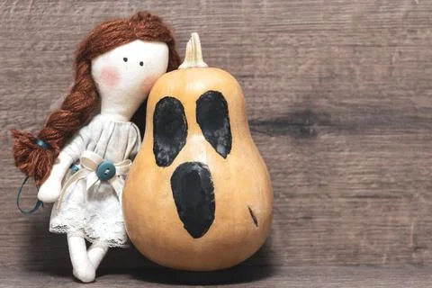 Doll, pumpkin, background Stock Photos