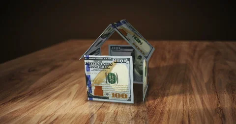 Dollar 100 USD money banknotes paper house on the table Stock Footage 201028201