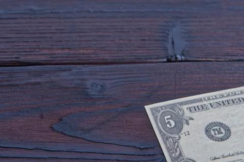 Dollar banknote on a table Stock Photos