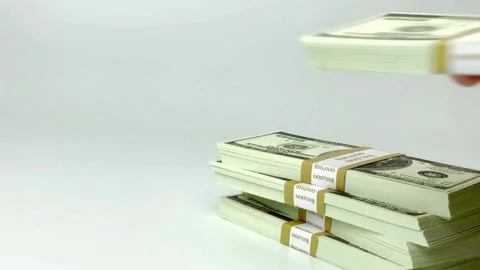 Dollar Banknotes against White Background. Close shot of Dollars bundle on .. Stock Footage 266473705