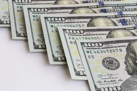 Dollar banknotes background. Close up view of pile of US dollars. Stock Photos
