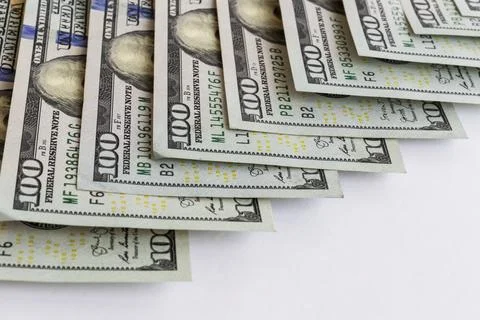 Dollar banknotes background. Close up view of pile of US dollars. Stock Photos